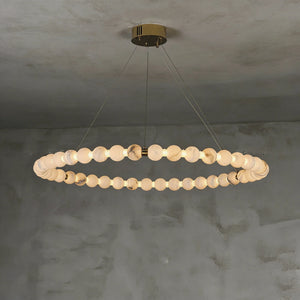Alabaster Beaded Ring Chandelier - Studio Low Angle View Grey Plaster Wall Lit | HoaiLamp