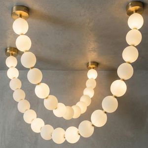 Dazzling Pearl Necklace Chandelier - Studio Grey Concrete Backdrop Double Tier Layered Loops Warm Glow | HoaiLamp