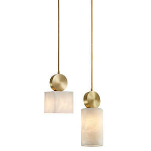 Cube and cylinder alabaster shades hung together at staggered heights