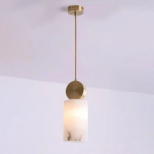 Full view of the lit cylinder alabaster pendant, from canopy to shade