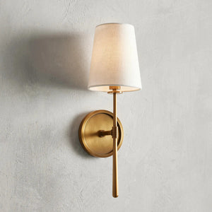 Rhoades Single Wall Sconce - Warm Glow on Plaster Wall | HoaiLamp