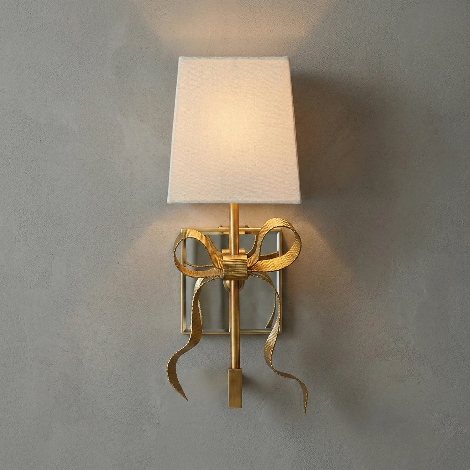 Ribbed Ribbon Bow Wall Lamp - Studio Grey Background Gold Finish White Fabric Shade | HoaiLamp