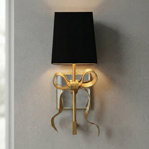 Ribbed Ribbon Bow Wall Lamp - Studio Grey Wall Lit Gold Finish Black Shade Angled | HoaiLamp