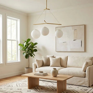 Triple Glass Orb Pendant Lamp-Bar Linear Chandelier - Bright Airy Living Space Fabric Sofa Potted Tree | HoaiLamp