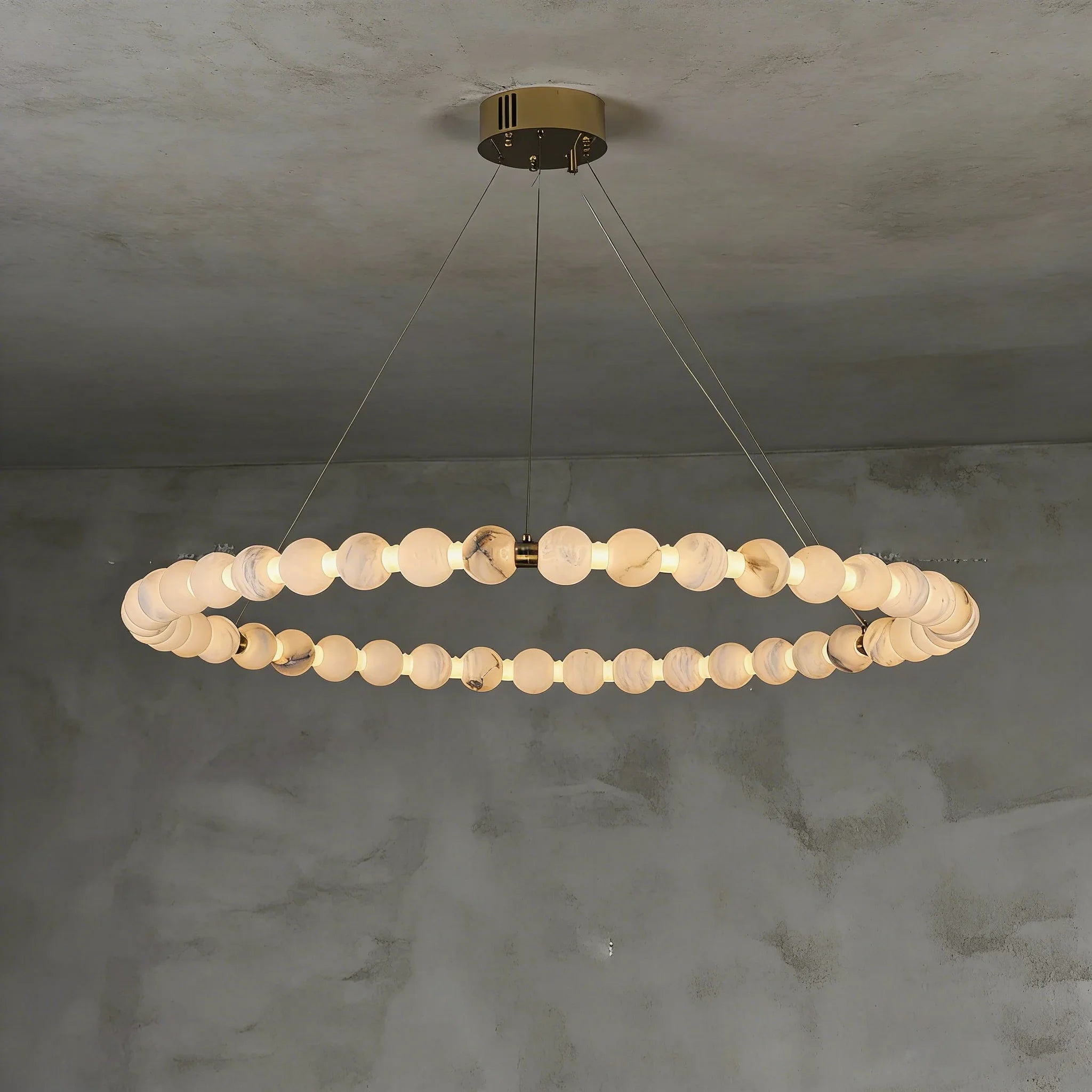 Alabaster Beaded Ring Chandelier - Studio Low Angle View Grey Plaster Wall Lit | HoaiLamp