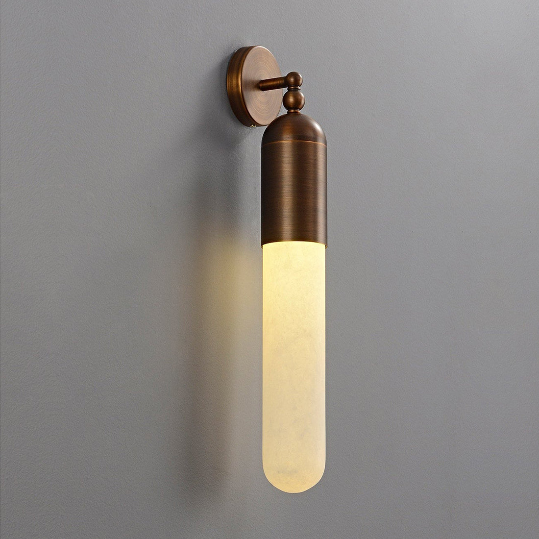 Alabaster Tube Wall Sconce - Studio Grey Background Angled Lit Profile | HoaiLamp