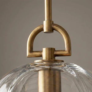 Auric Round Pendant Light by Hoailamp - Macro D-ring brushed brass hardware detail