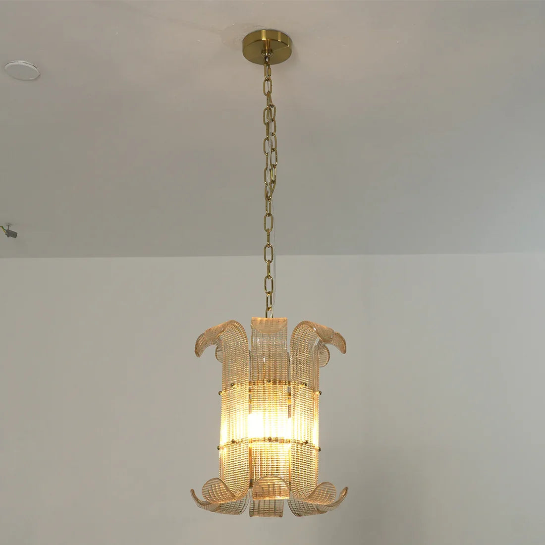 Curved Glass Slat Drum Wall Lamp - Studio Off White Wall Low Angle Warm Light | HoaiLamp