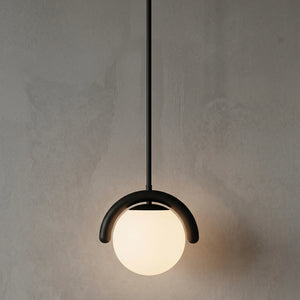 Curved Linear Opal Globe Pendant - Black Single Globe Illuminated Glow | HoaiLamp