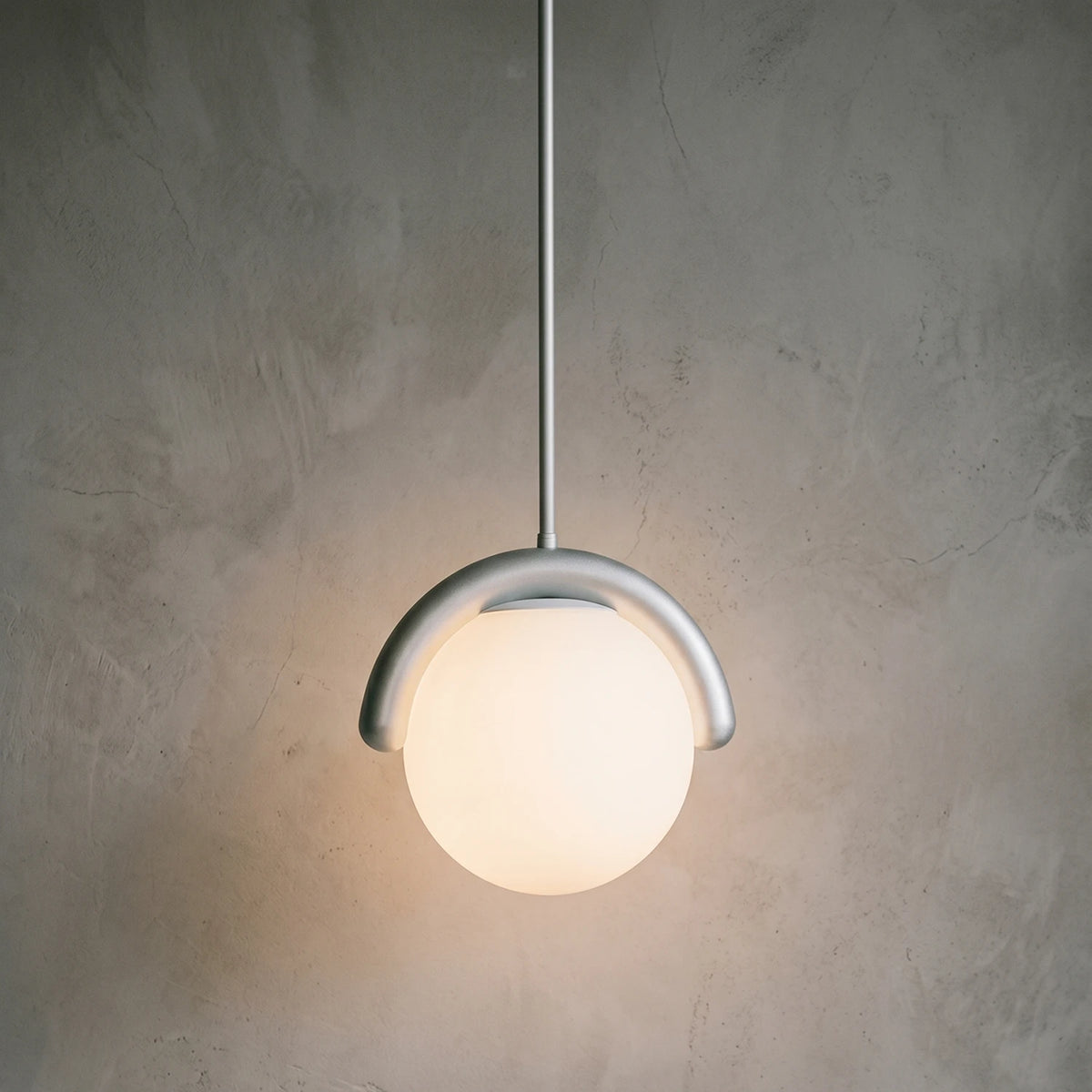 Curved Linear Opal Globe Pendant - Chrome Single Globe Illuminated Glow | HoaiLamp