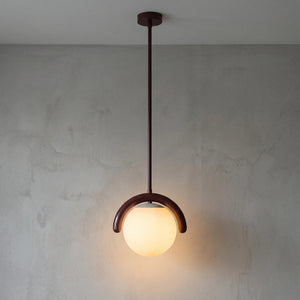 Curved Linear Opal Globe Pendant - Reddish Brown Single Globe Illuminated Glow | HoaiLamp