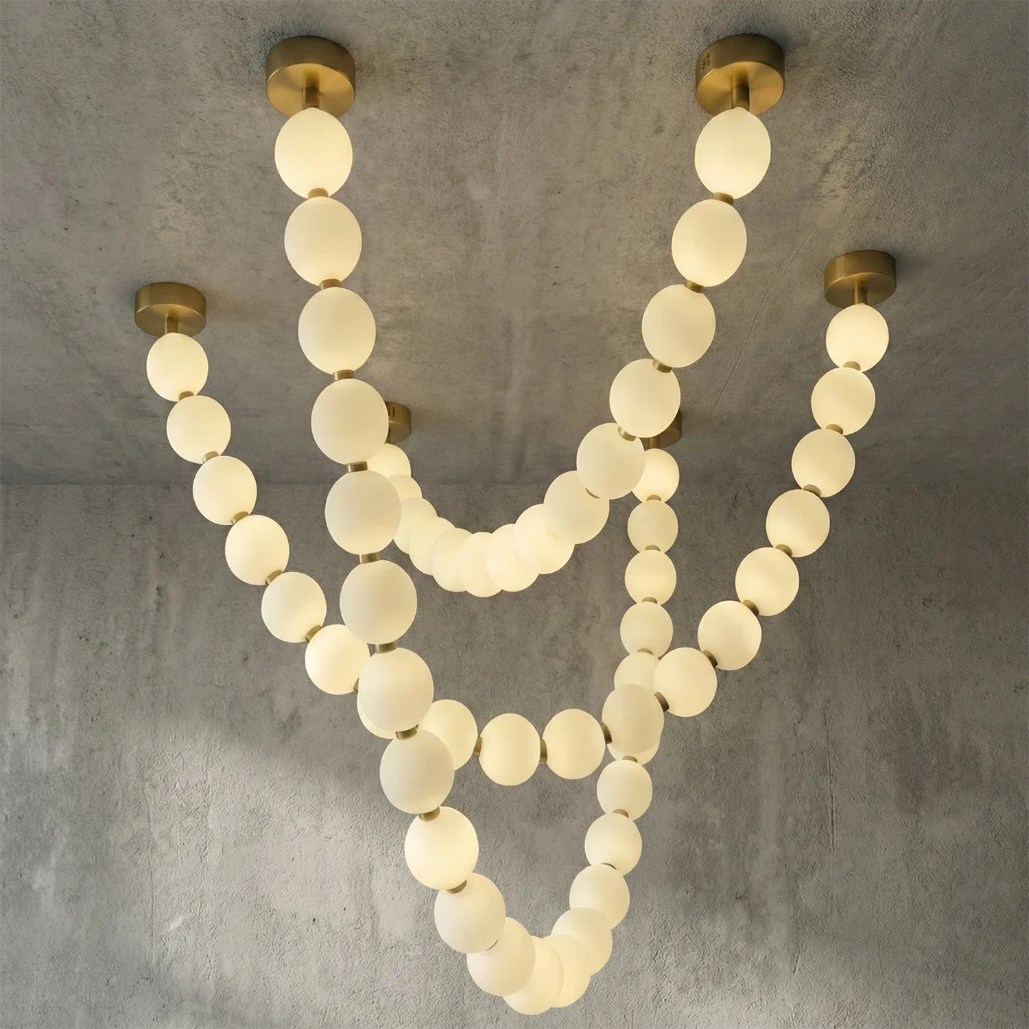 Dazzling Pearl Necklace Chandelier - Studio Grey Concrete Backdrop Triple Tier Cascading Multi Loop | HoaiLamp