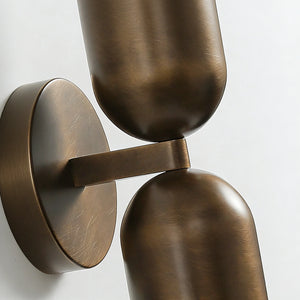 Fixed Down Brass Capsule Sconce - Double-Headed Structural Detail | HoaiLamp
