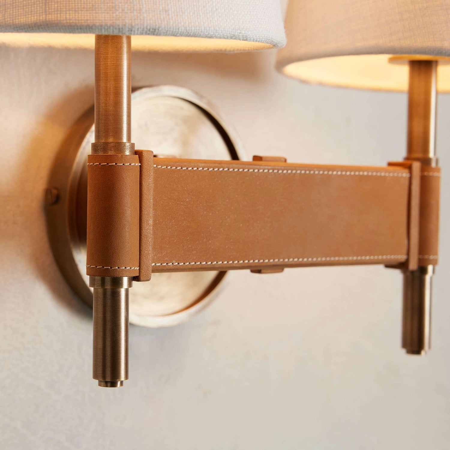 Hastings Leather Wall Lamp - Double Head Brass Horizontal Arm Leather Stitching Close-Up | HoaiLamp