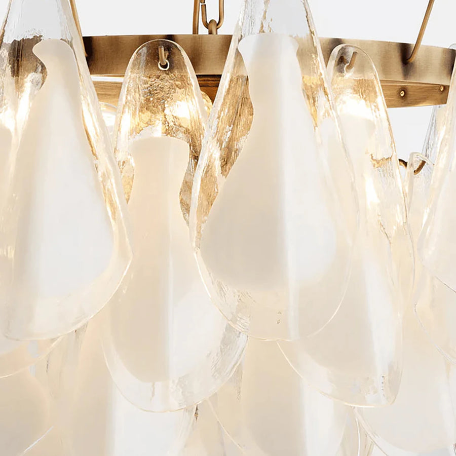 Meticulous Surface FinishingShowcases brushed brass and glass textures.