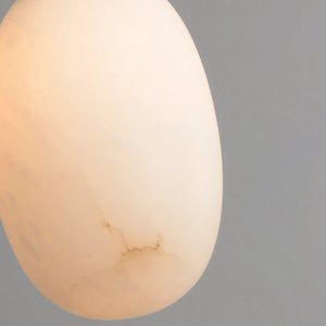 Oval Alabaster Pendant Light - Macro Detail showing Natural Earthy Veining in Translucent Alabaster Stone | HoaiLamp