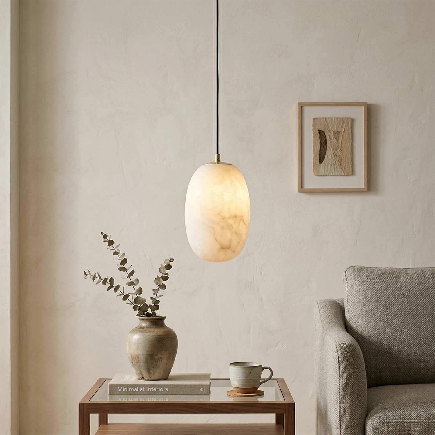 Oval Alabaster Pendant Light - Cozy Living Room Corner featuring Stone Pendant Light and Textured Plaster Walls | HoaiLamp