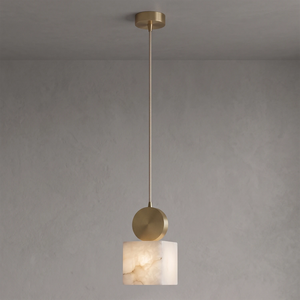 Cube alabaster shade lit with a warm glow in a grey corner