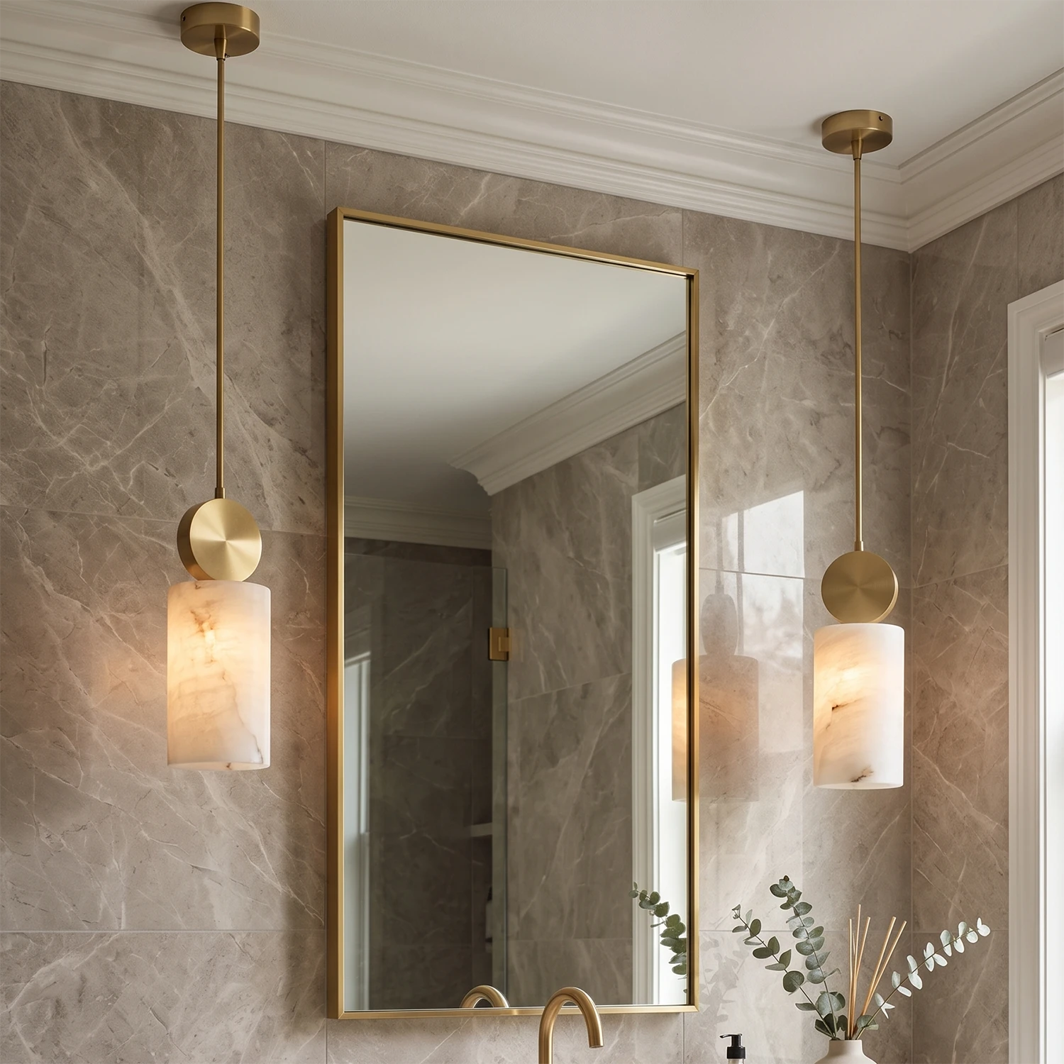 Pair of alabaster mini pendants flanking a vanity mirror in a dry powder room