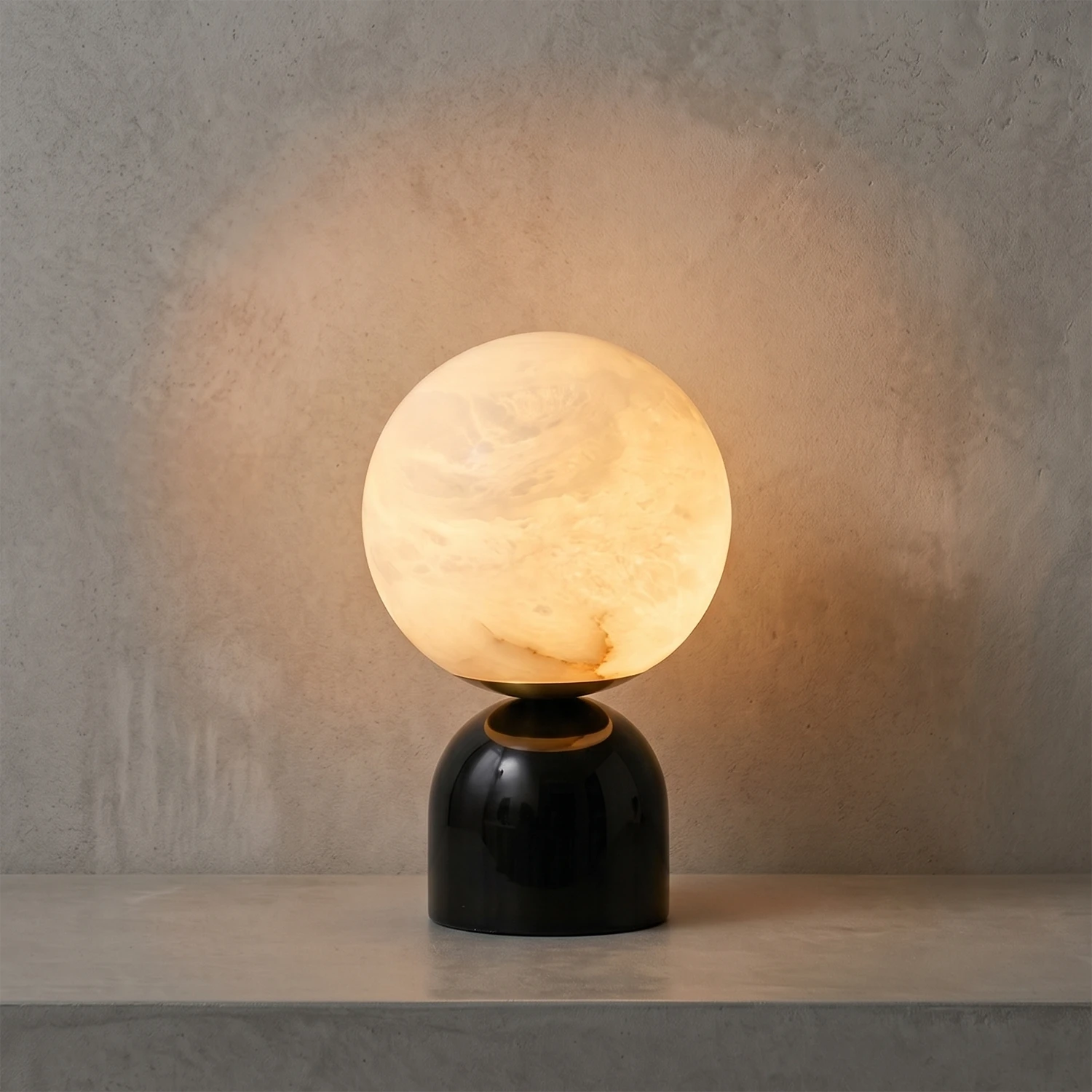 Round Alabaster Table Lamp - Studio Grey Concrete Backdrop Black Marble Base Smooth Sphere Warm Lit | HoaiLamp