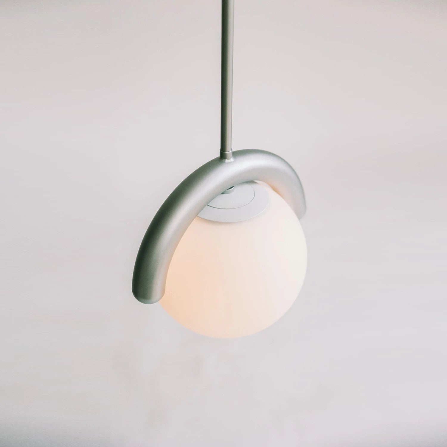 Curved Linear Opal Globe Pendant - Art Deco Curved Metal Profile Close-up | HoaiLamp