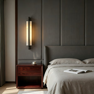 Sleek Alabaster Brass Wall Light - Luxury Bedroom Dark Gray Fluted Headboard Ambiance | HoaiLamp