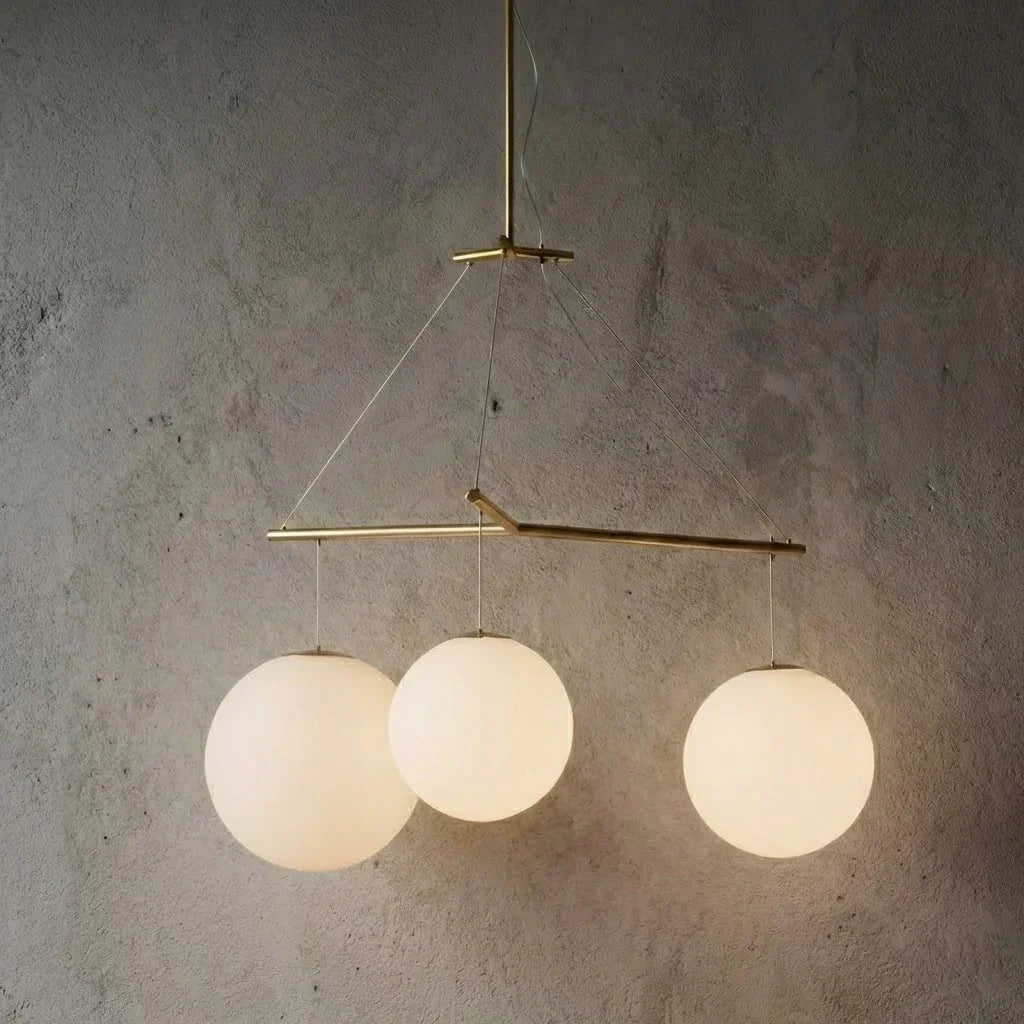 Triple Glass Orb Pendant Lamp-Bar Linear Chandelier - Studio Grey Concrete Wall Lit 3 Light Ambient Glow | HoaiLamp